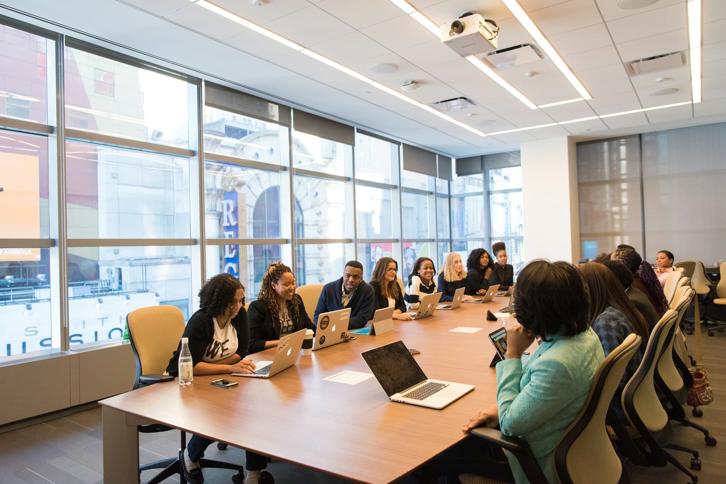 A sales team collaborating in a working session